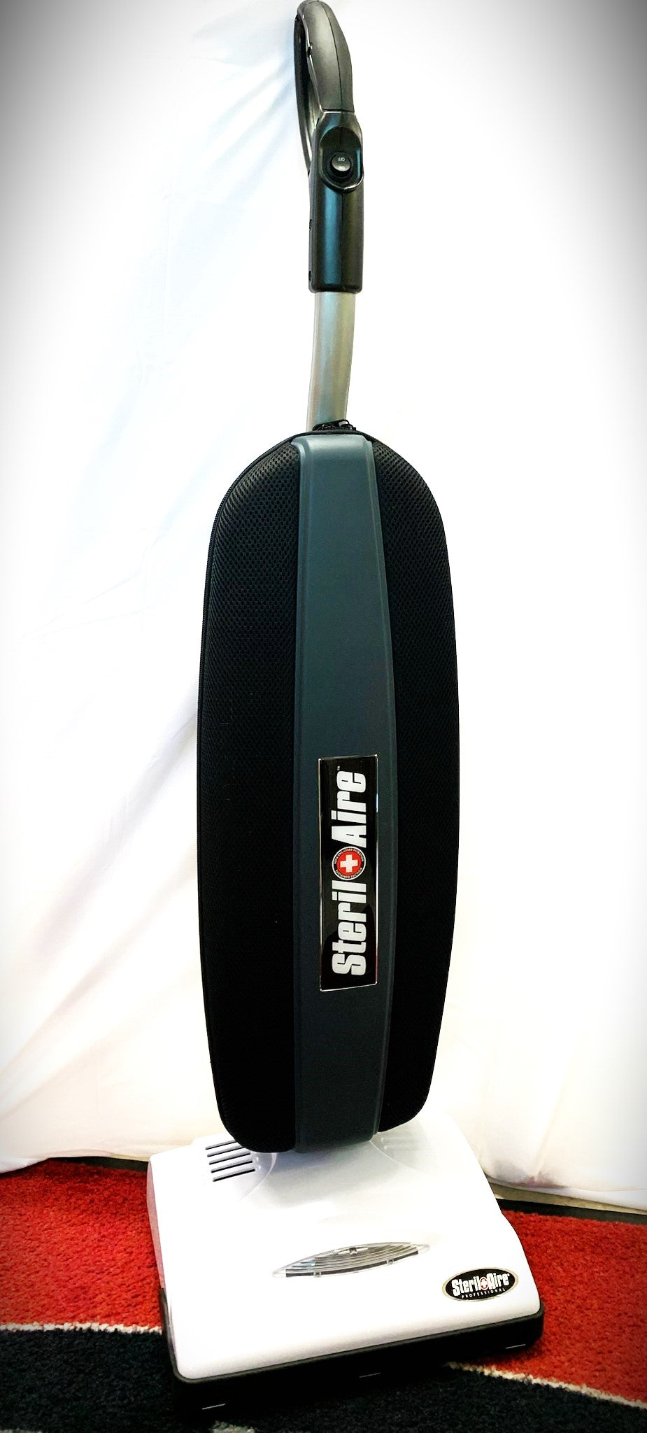 STERIL-LITE LIGHTWEIGHT CORDLESS BATTERY POWERED UPRIGHT VACUUM CLEANER